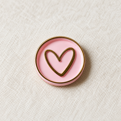 Primer plano de un sello adhesivo Corazón rosa y negro Signature